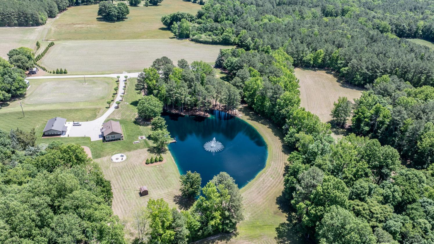 87.84 ACRES WITH FARM HOUSE AND POND - photo 2
