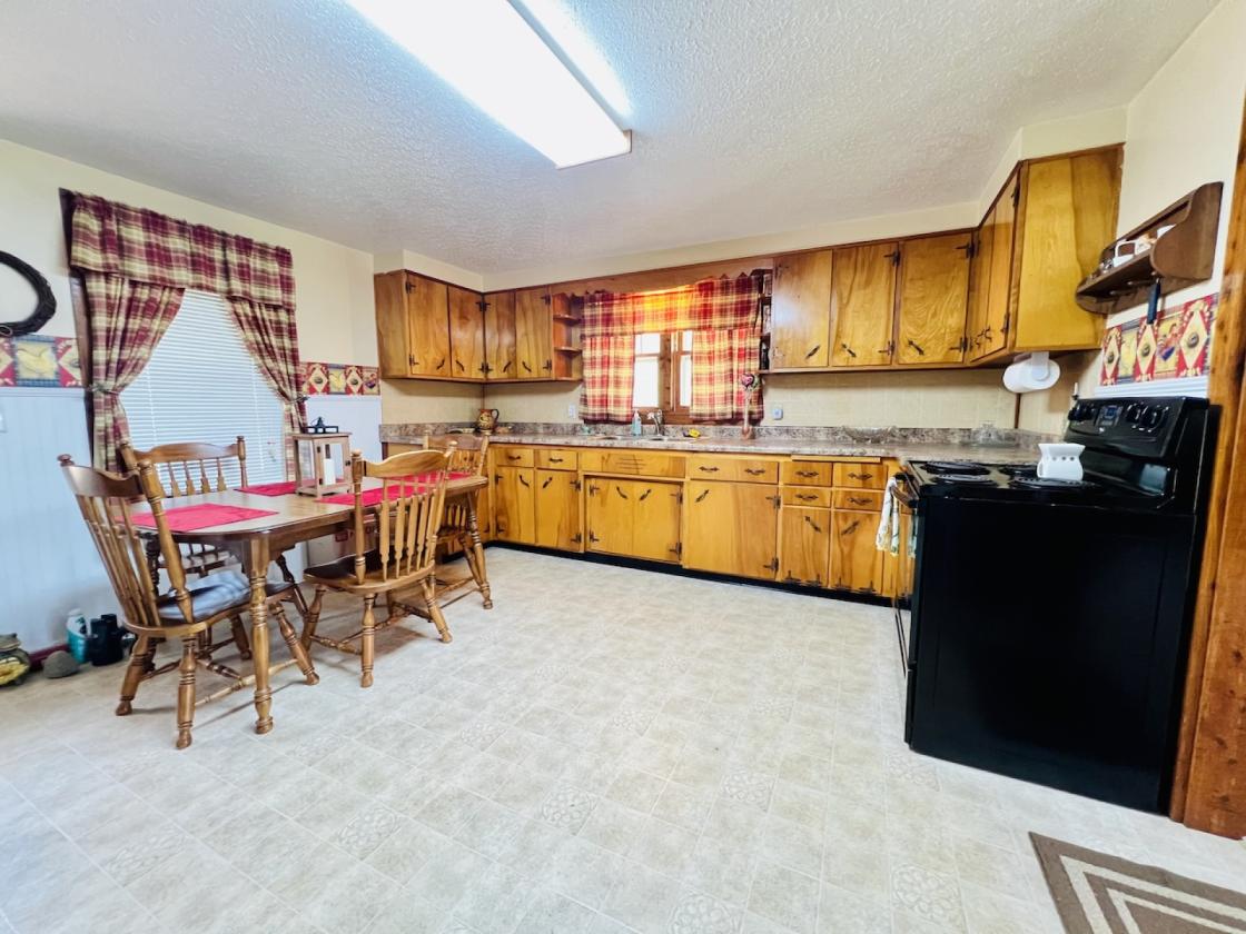 10.65 Ac. m/l with House & Workshop near Lake! - photo 9