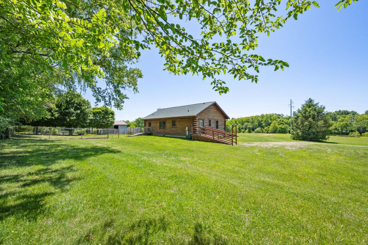 Log cabin nestled on 8.2 picturesque acres - photo 27