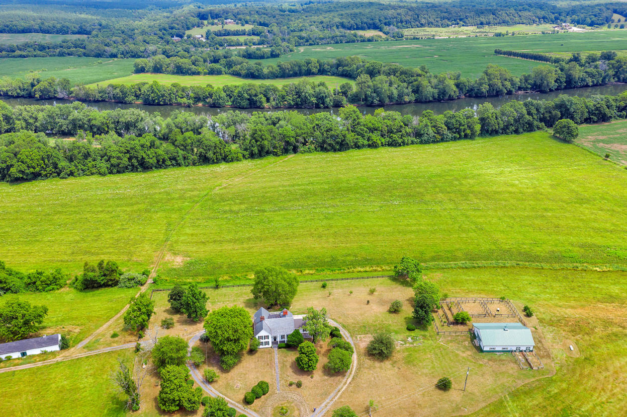 Wonderful Riverfront property with pasture and barn on over 50