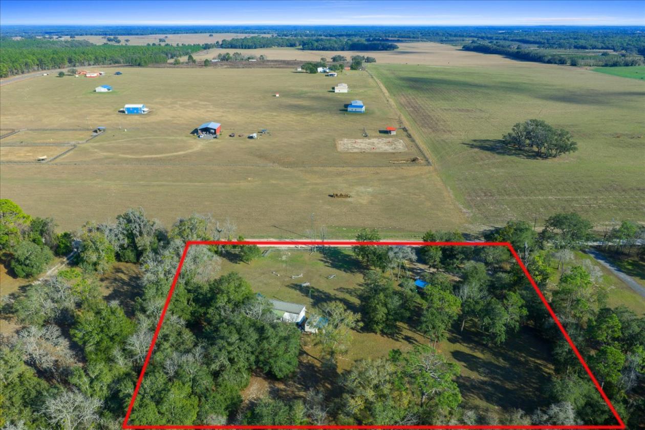 2.5 Acres of Mini Farm Living + Income Potential! - photo 27