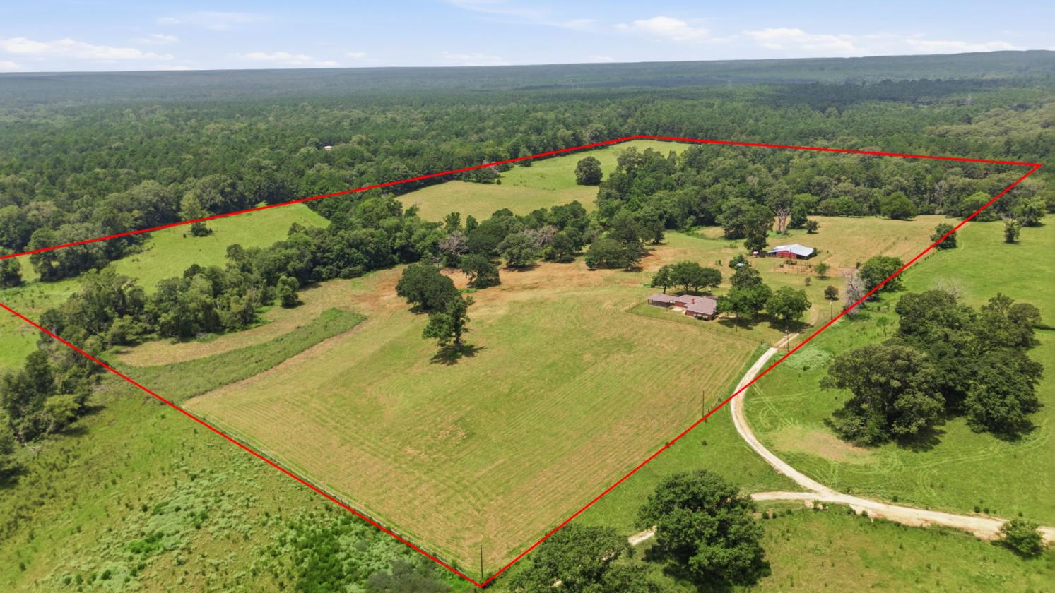 ~66 Acres + Updated Ranch Home + Ponds & Barn! - photo 2