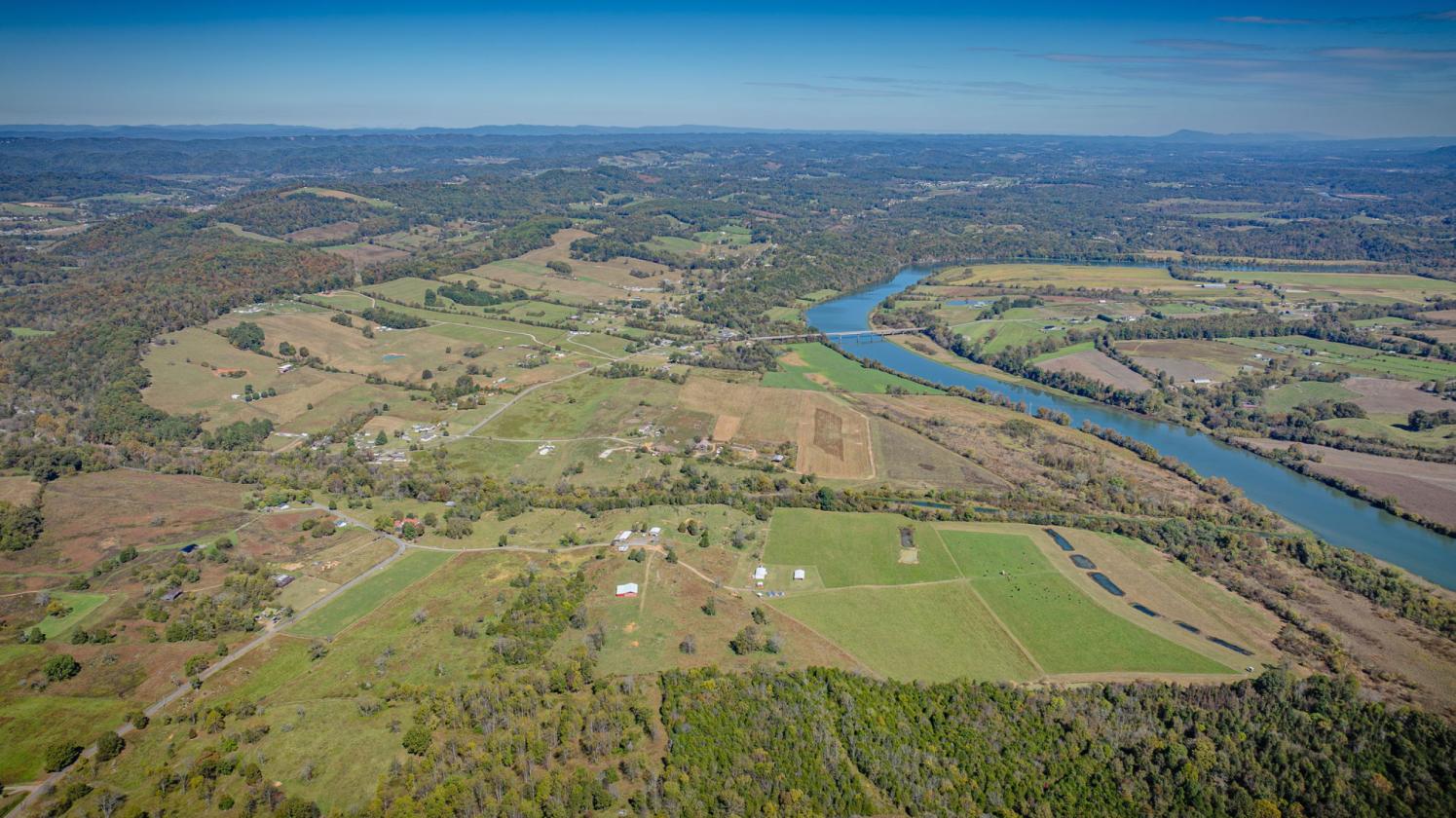 150 Acres and Farm House along Big Creek - photo 2