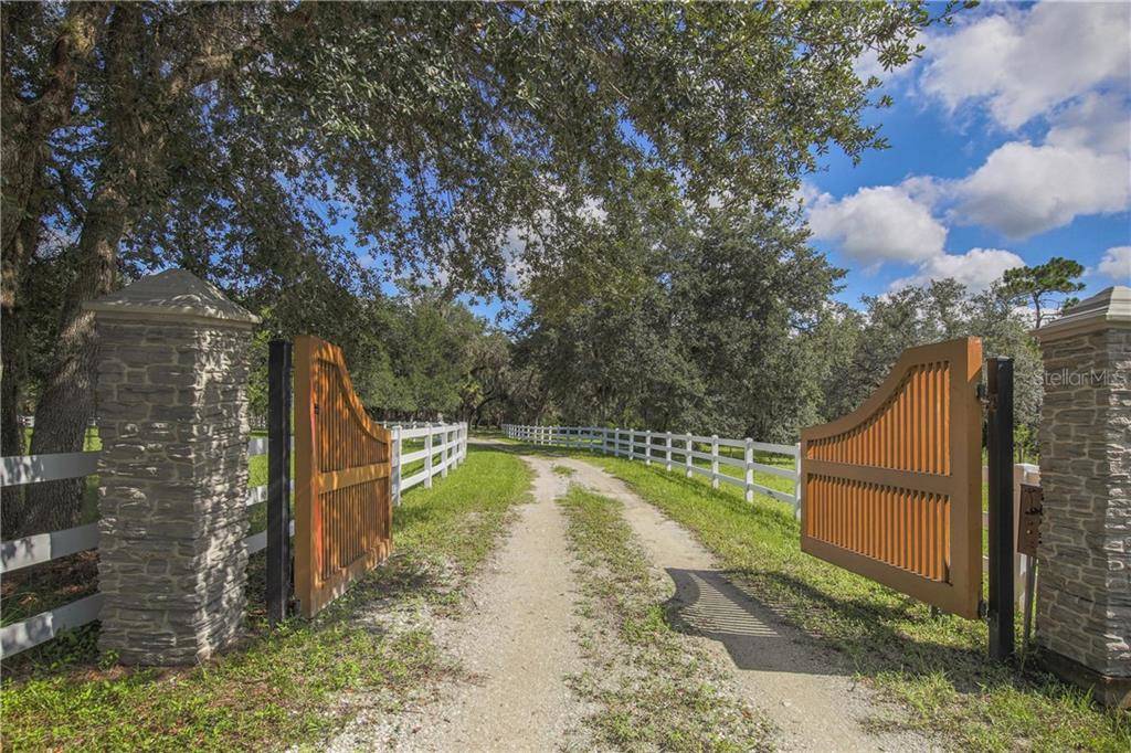 Luxury 20 Acre Equestrian Estate with Barn, pond and Infinity