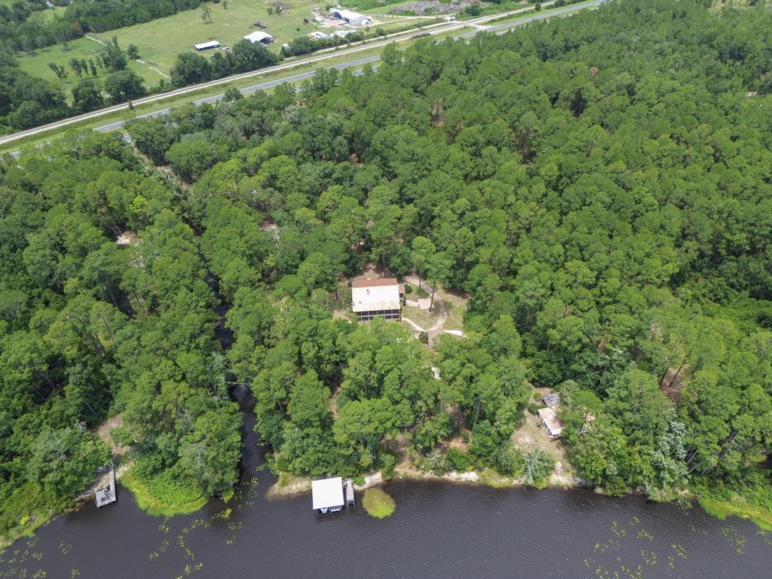 Luxury lake estate with acreage and horse stalls - photo 25