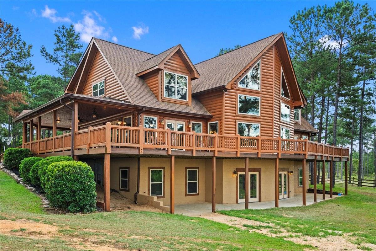 Equestrian Retreat custom log home on 68 Acres  - photo 1