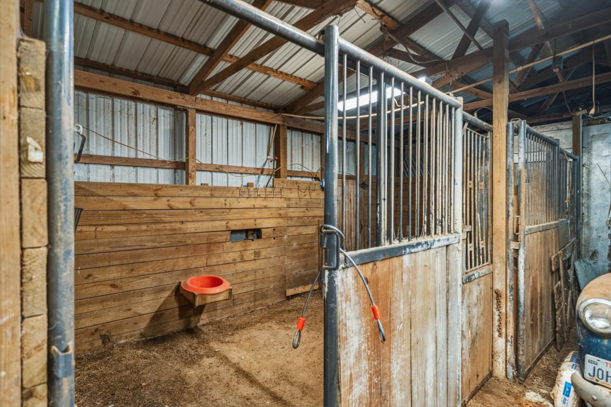 5+ Acres | Multiple Barns & Outbuildings + Home - photo 8
