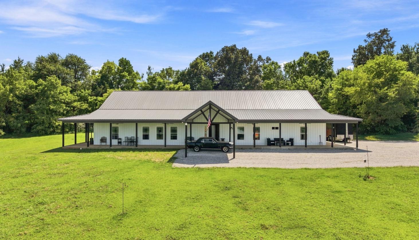 Multigenerational Home with 32 Acres & Horse Barn - photo 1