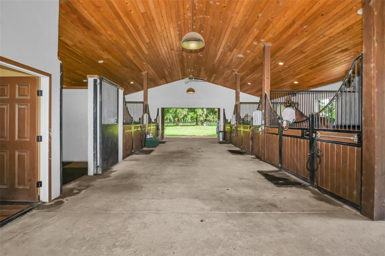 10.58-Acre Horse Farm with a 7 Stall Block Barn! - photo 10