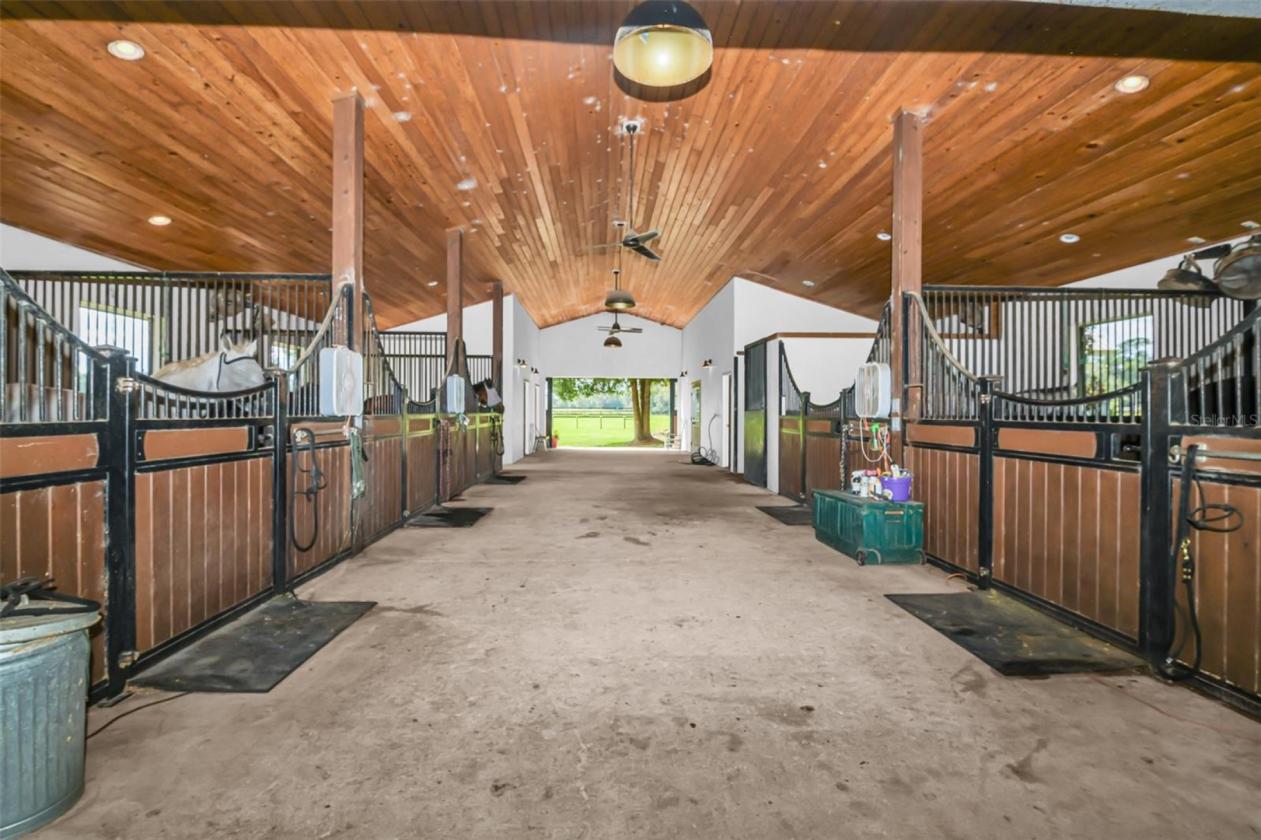 10.58-Acre Horse Farm with a 7 Stall Block Barn! - photo 11
