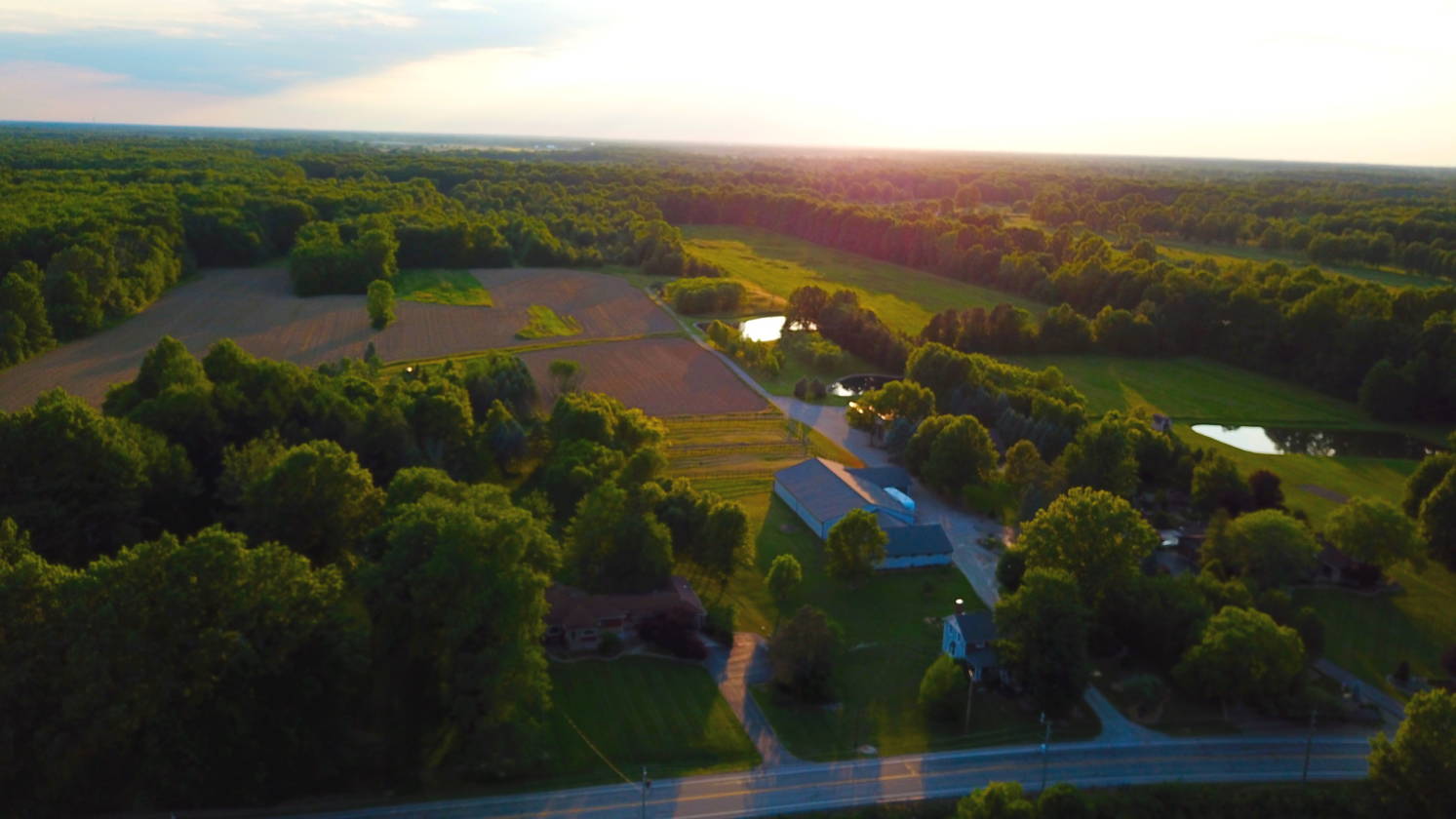 Completely renovated colonial with 9 stall barn, 11.2 acres and