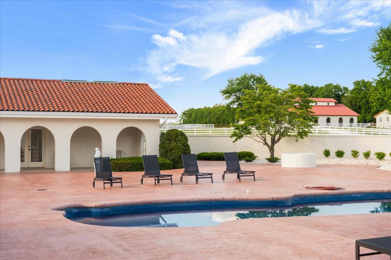 Iconic luxury remodeled estate with 66 acres! - photo 17