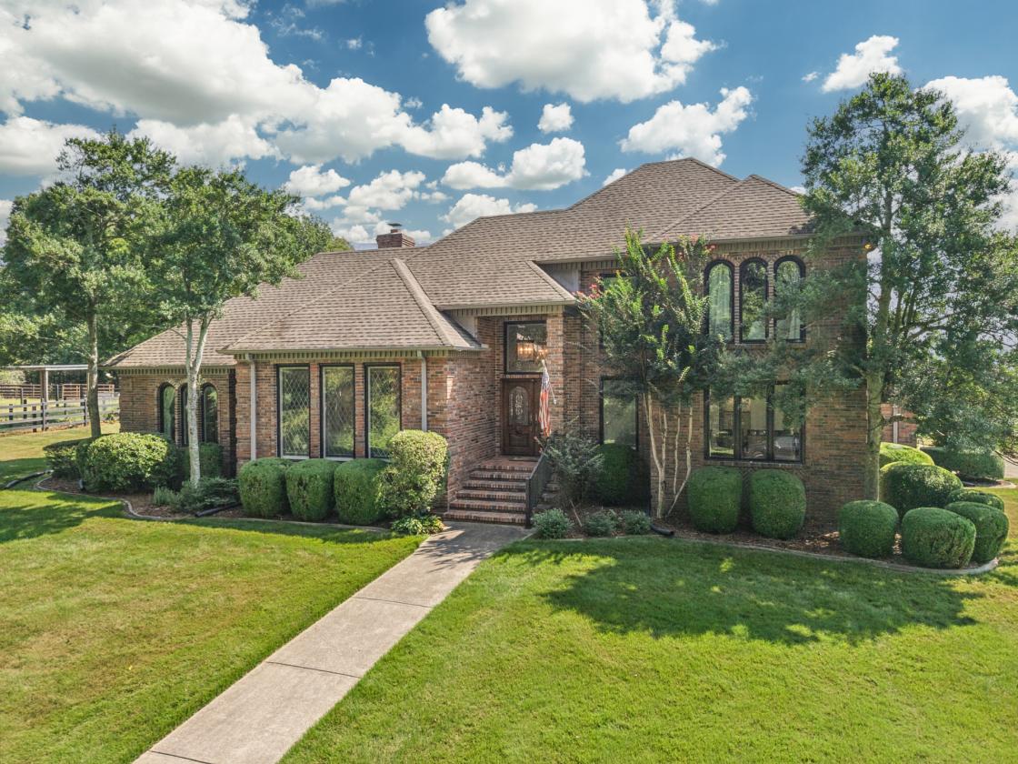 Executive-style home on 11+ acres in Elkmont, AL - photo 2