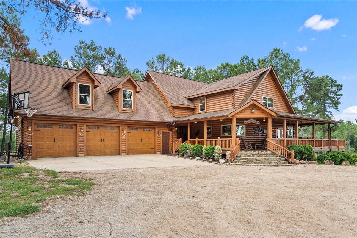 Equestrian Retreat custom log home on 68 Acres  - photo 28