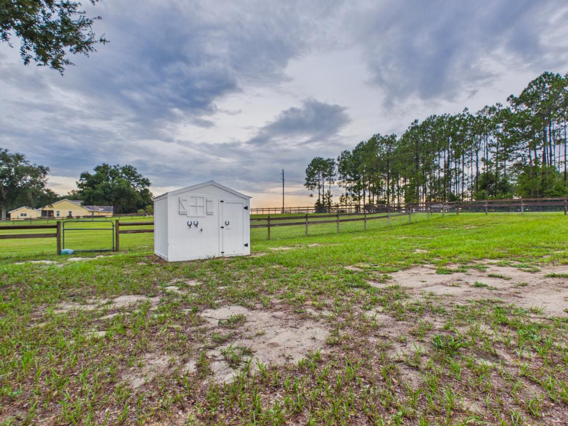5-Acre Horse Property with Stable & Custom Garage - photo 9