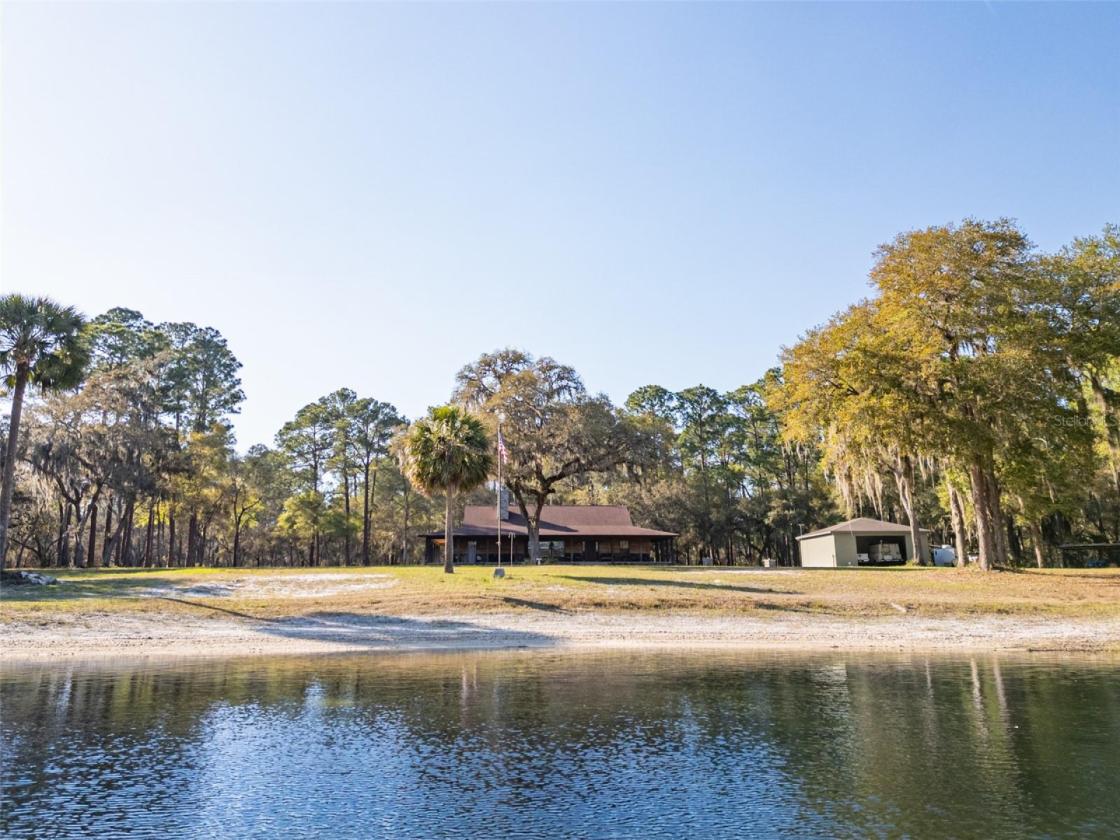 10 Acre Lakefront Estate w. 400k acre Trail Access - photo 4