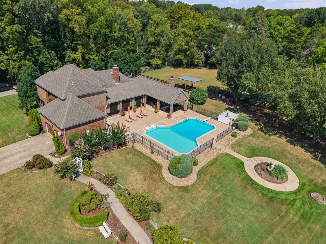Executive-style home on 11+ acres in Elkmont, AL - photo 3