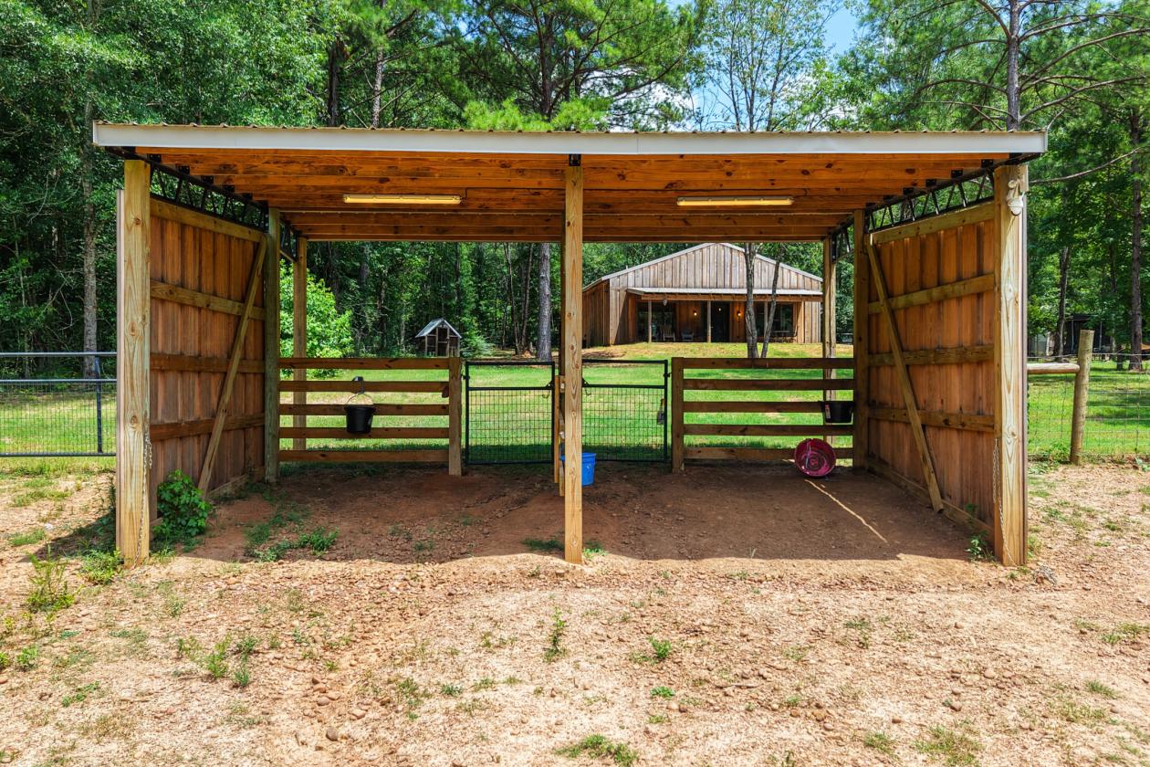 89.99 acre horse farm with lighted arena & more - photo 18
