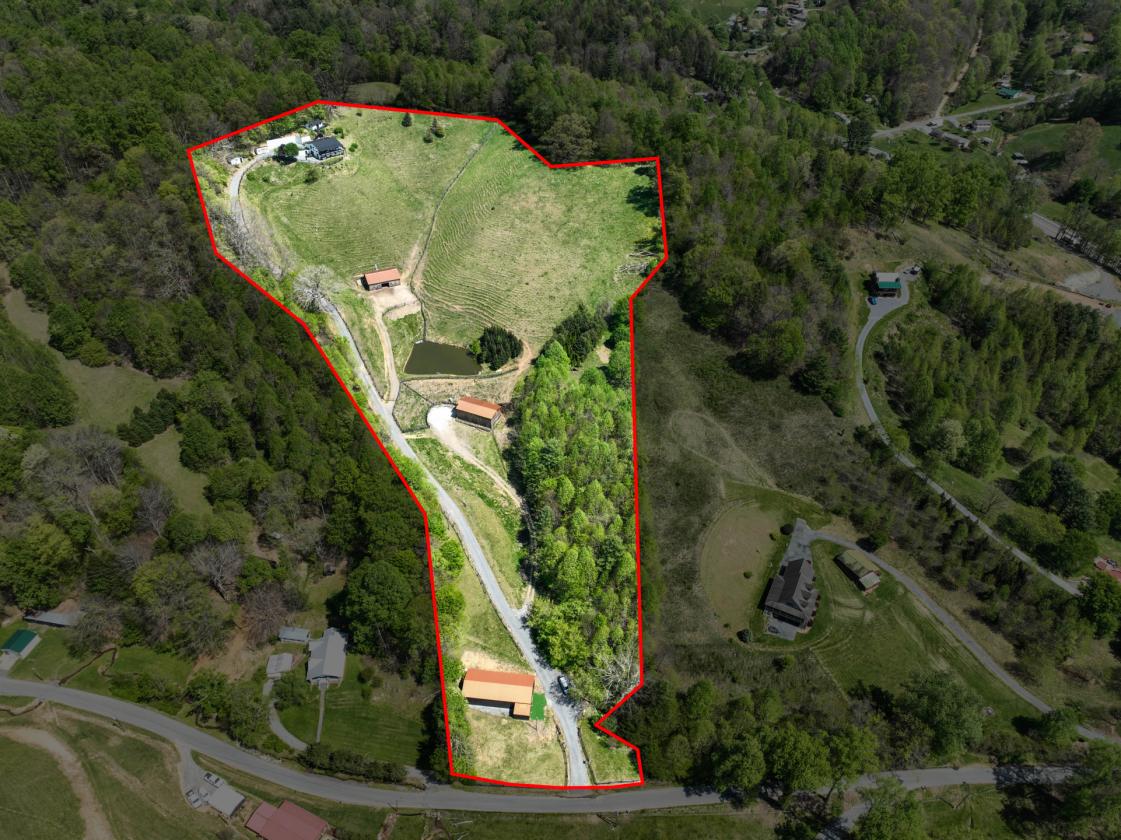 10 acres, multiple barns & homes, farm pond - photo 27