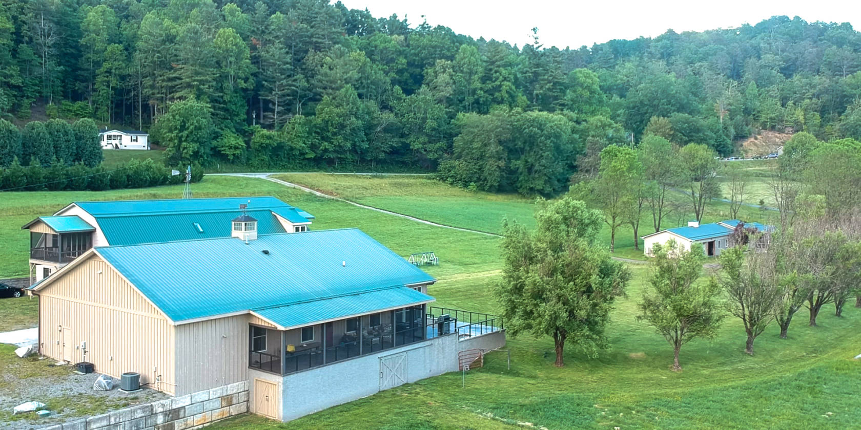 Little River Farm with turn key horse stables, and river... Pisgah