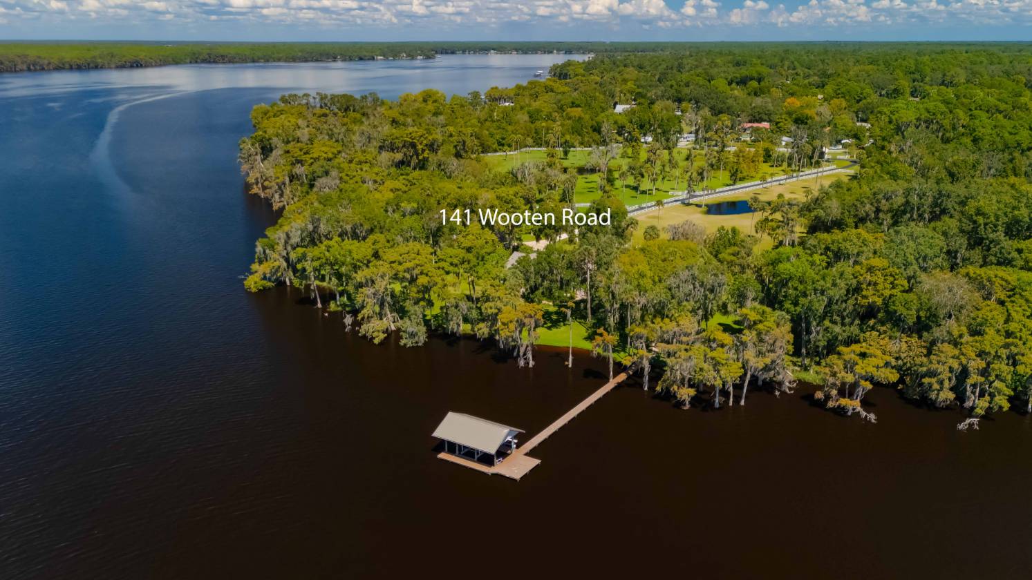 GORGEOUS RIVERFRONT PROPERTY WITH DOCK AND BARNS - photo 11