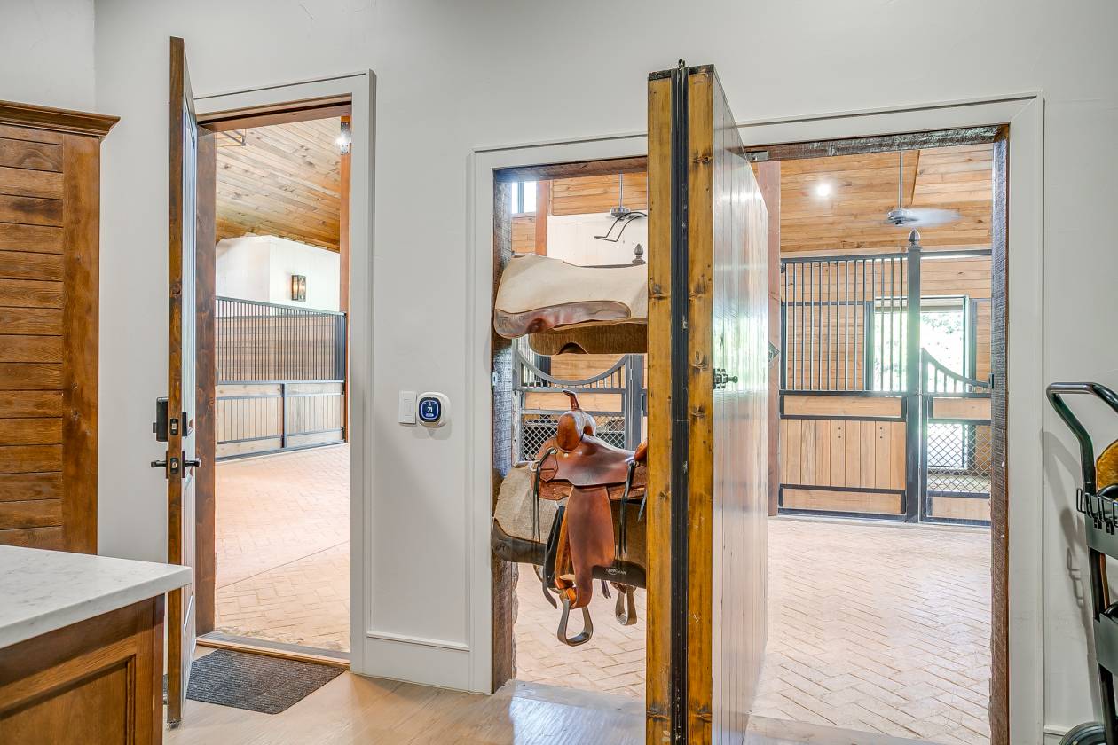 TK Trails | 8-Stall Barn | Covered Arena - photo 11