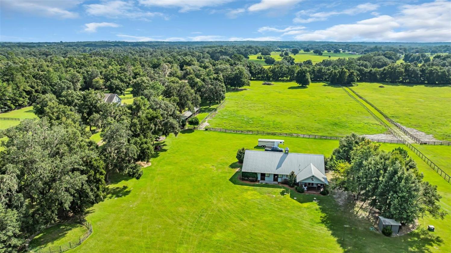 10.58-Acre Horse Farm with a 7 Stall Block Barn! - photo 21