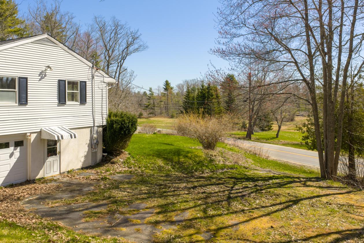 Split level ranch on 10 wooded acres in West Bath - photo 12