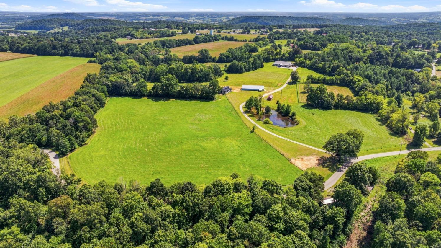 Multigenerational Home with 32 Acres & Horse Barn - photo 6