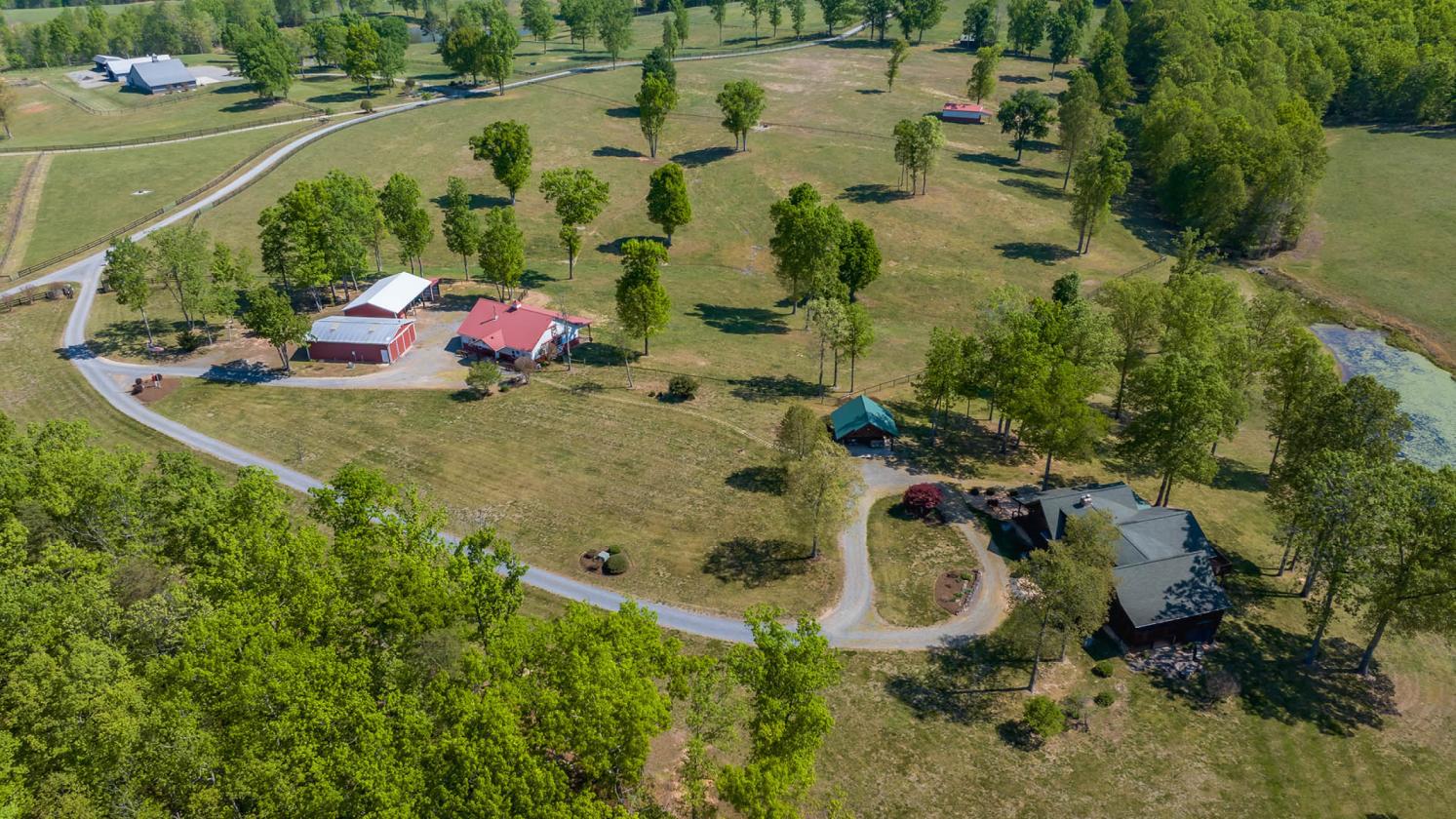 243-Acre Horse Farm w/ Log Home & Stable - photo 3