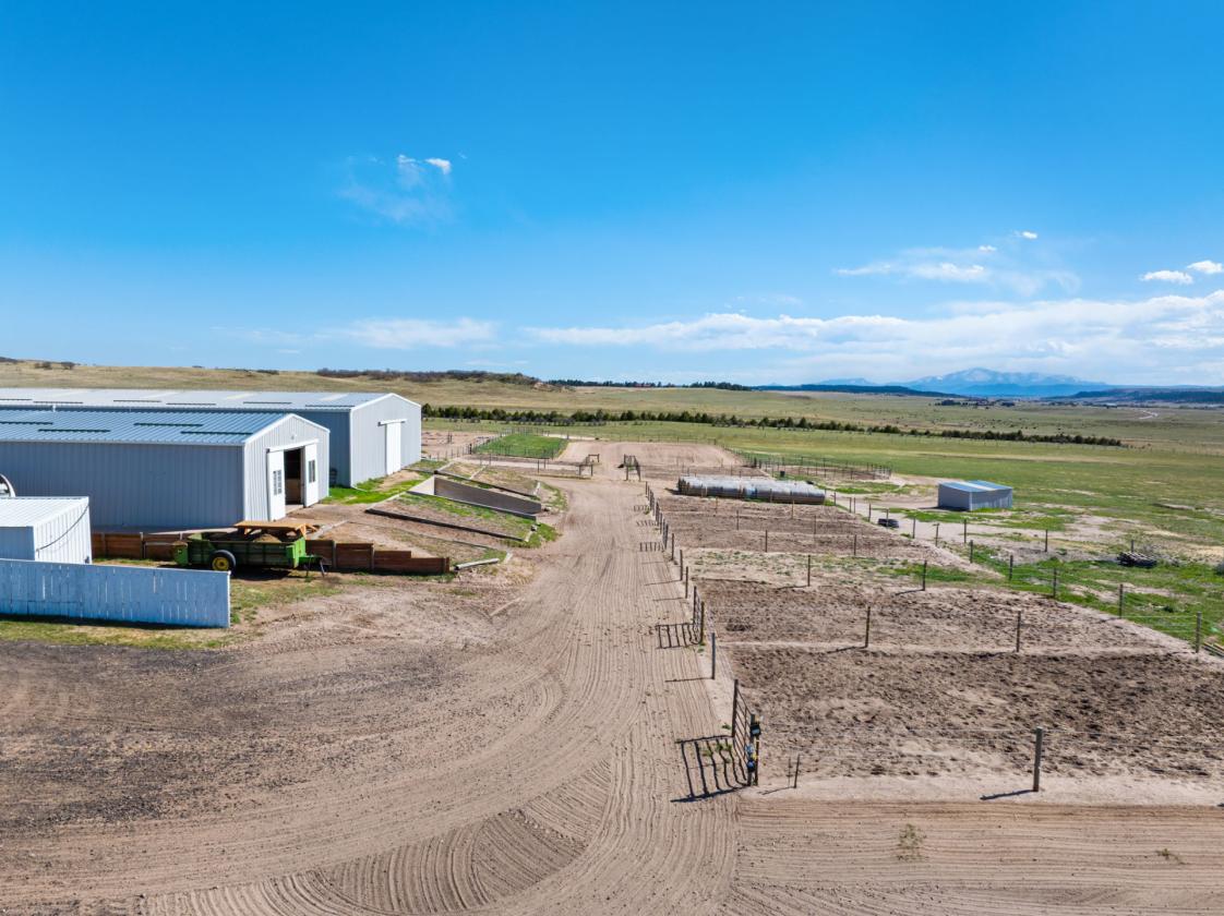 36 Breathtaking Acres w/ 15 Stalls & 3 Arenas - photo 24