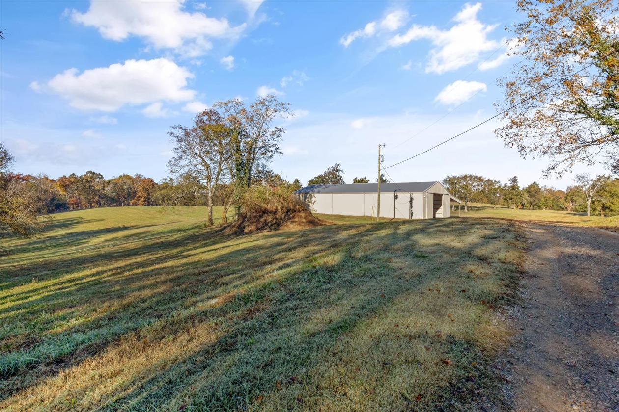 50-Acre Horse Farm w/ Barns & Beautiful Pasture - photo 12