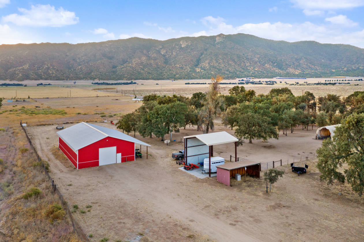 STUNNING EQUESTRIAN PROPERTY ON 10 ACRES WITH SHOP AND HAY