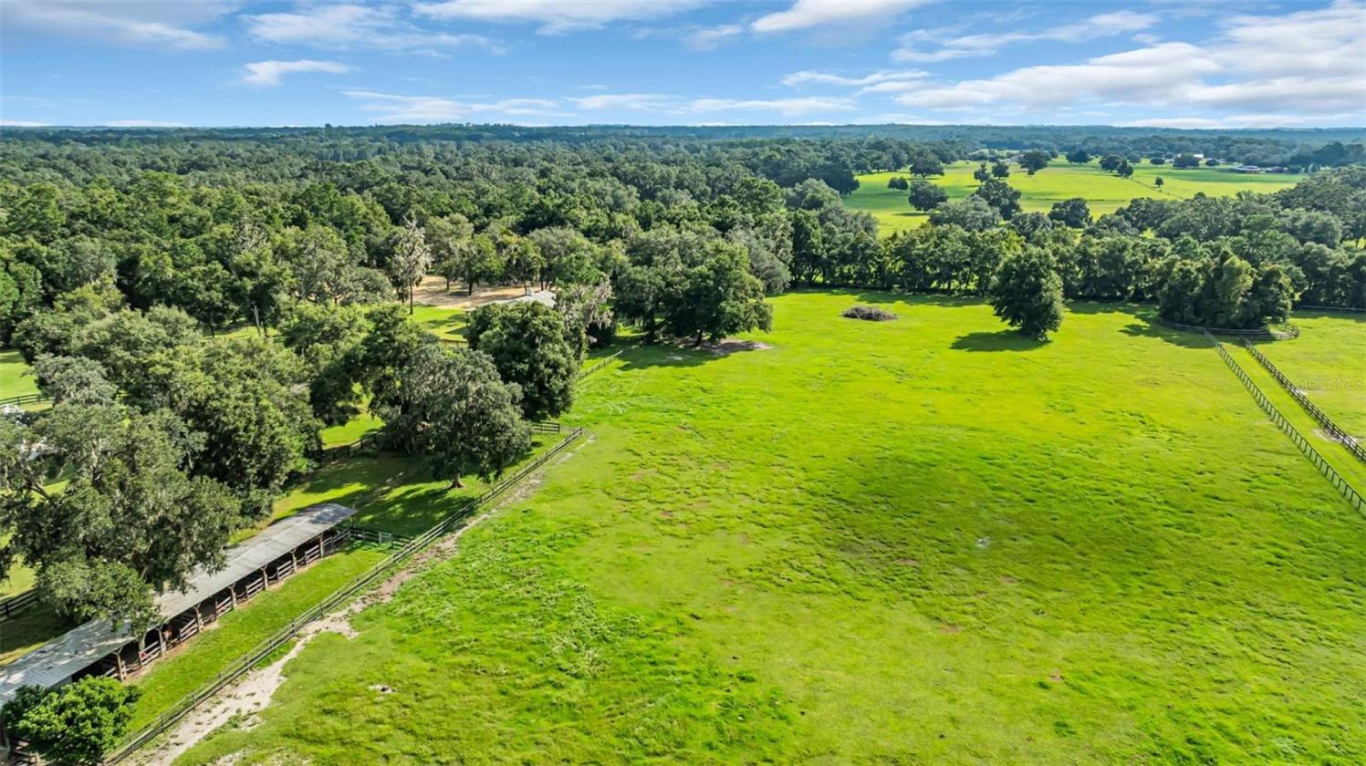 10.58-Acre Horse Farm with a 7 Stall Block Barn! - photo 23