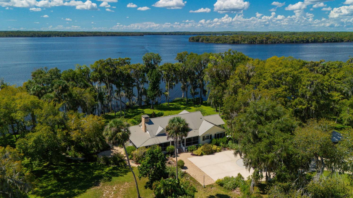GORGEOUS RIVERFRONT PROPERTY WITH DOCK AND BARNS - photo 1