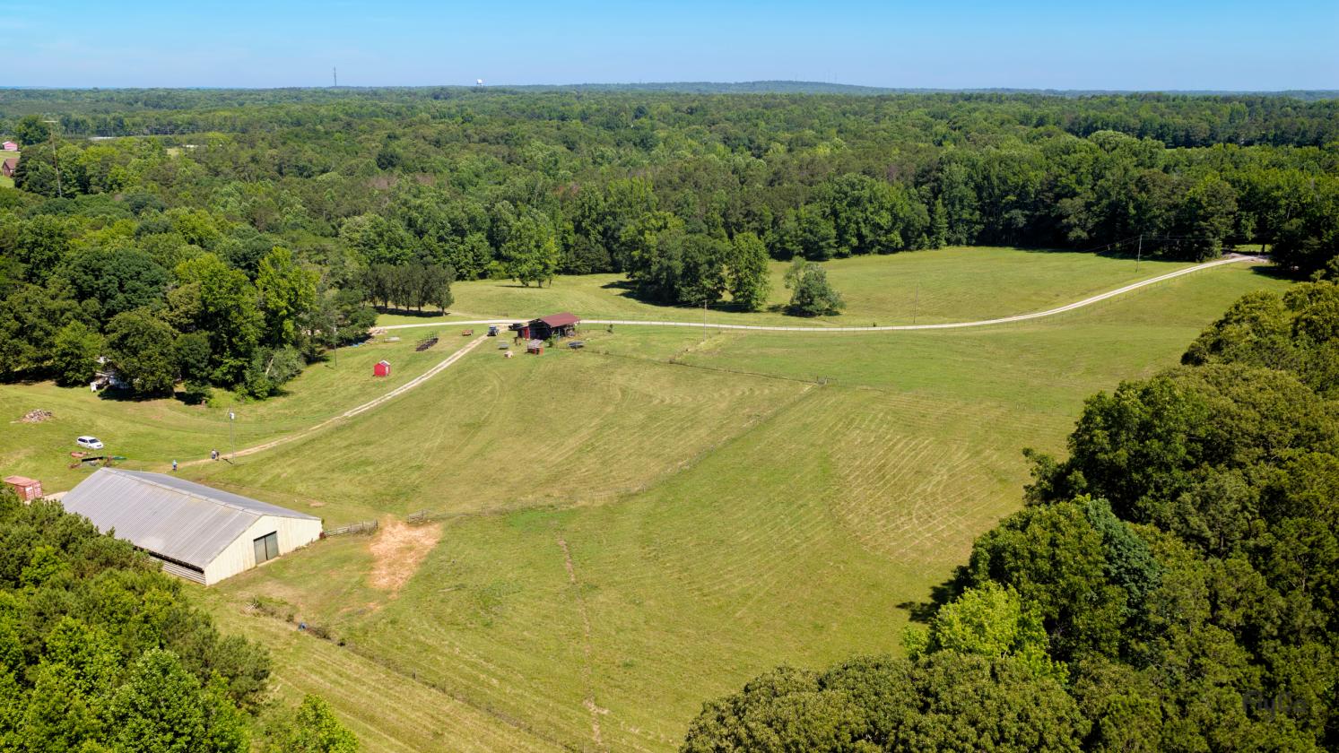 50 Acres with Massive 7-Stall Barn & Expan Potential - photo 2