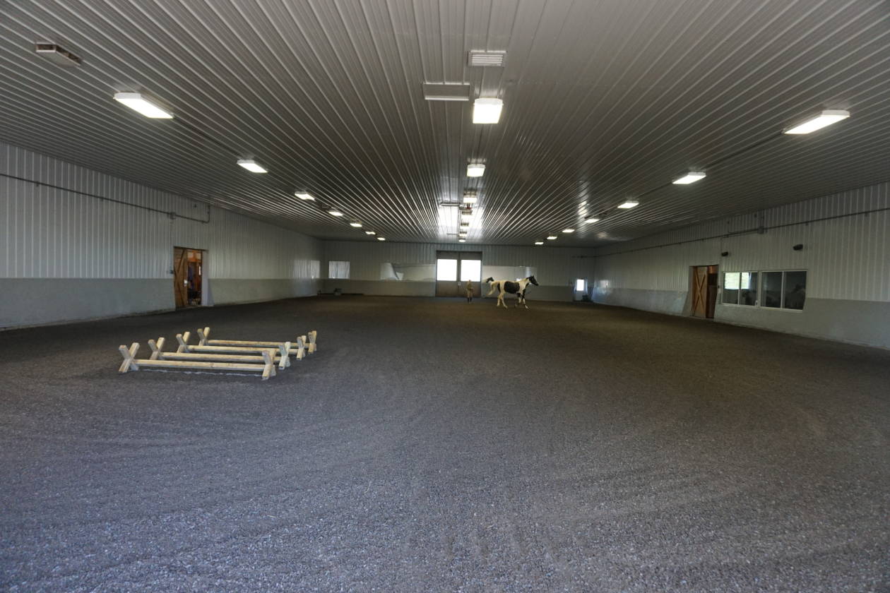 Luxury equestrian facility with remodeled home on a spectacular 21