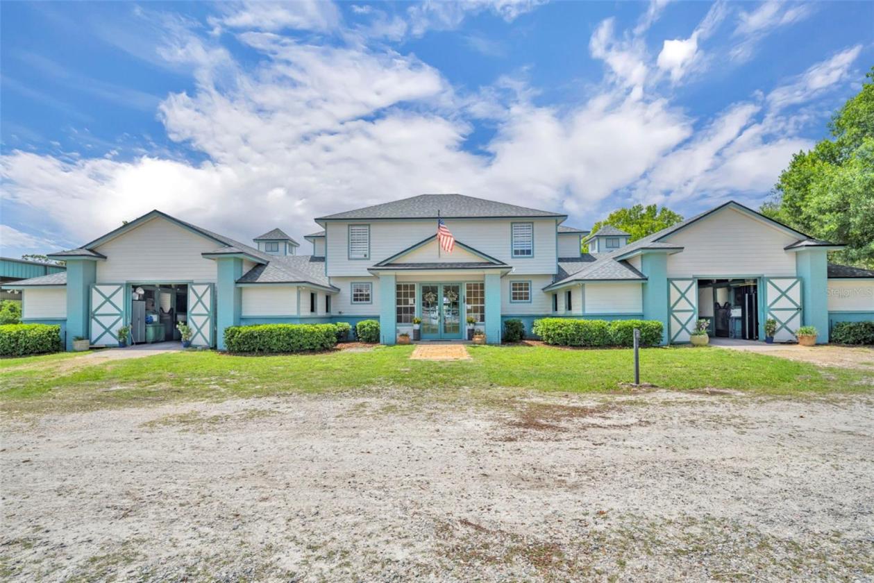 PRICE DROP - 23 Stalls - 2 Homes - Covered Arena - photo 1