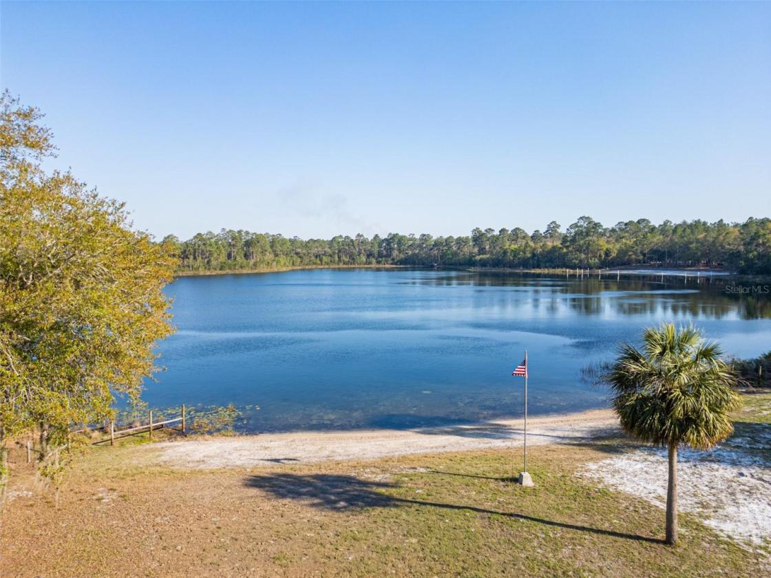 10 Acre Lakefront Estate w. 400k acre Trail Access - photo 5