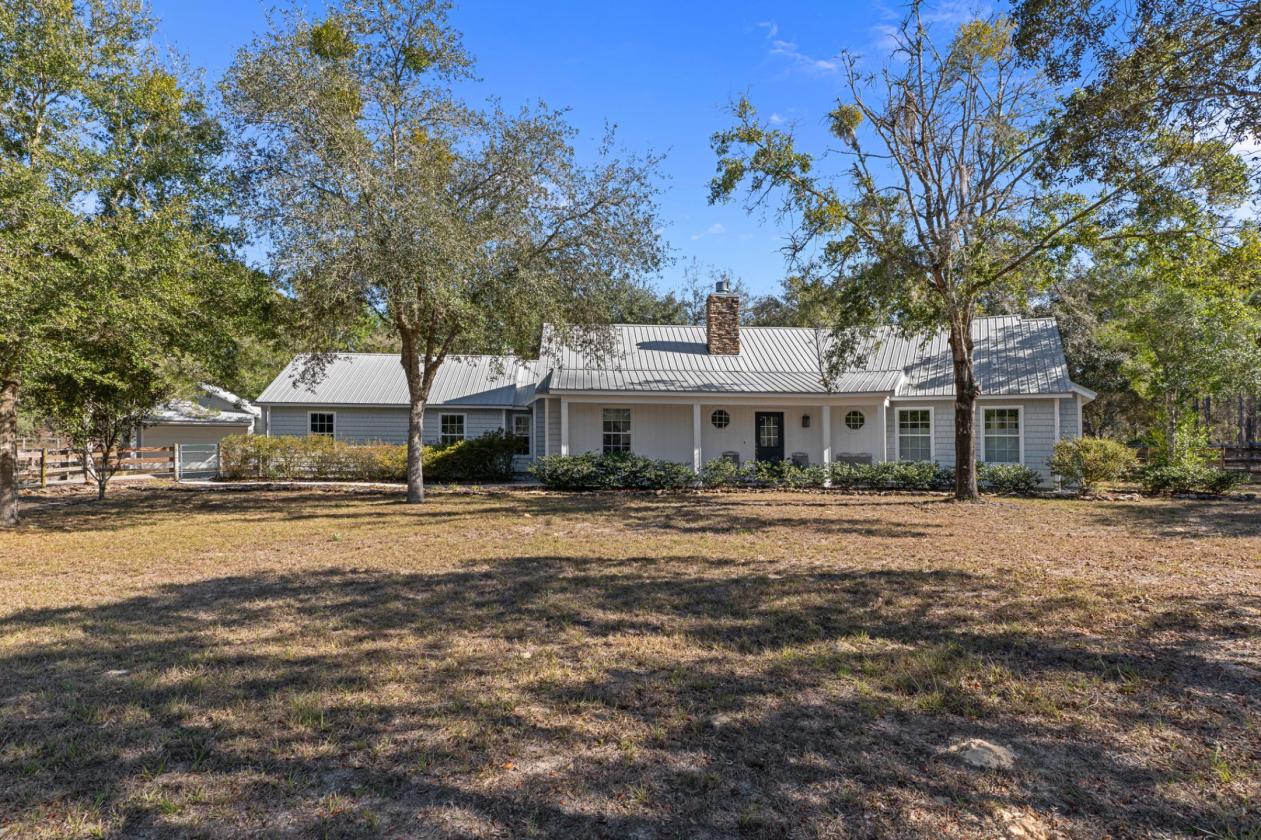 A Rare Equestrian Retreat in Pine Ridge Estates - photo 1