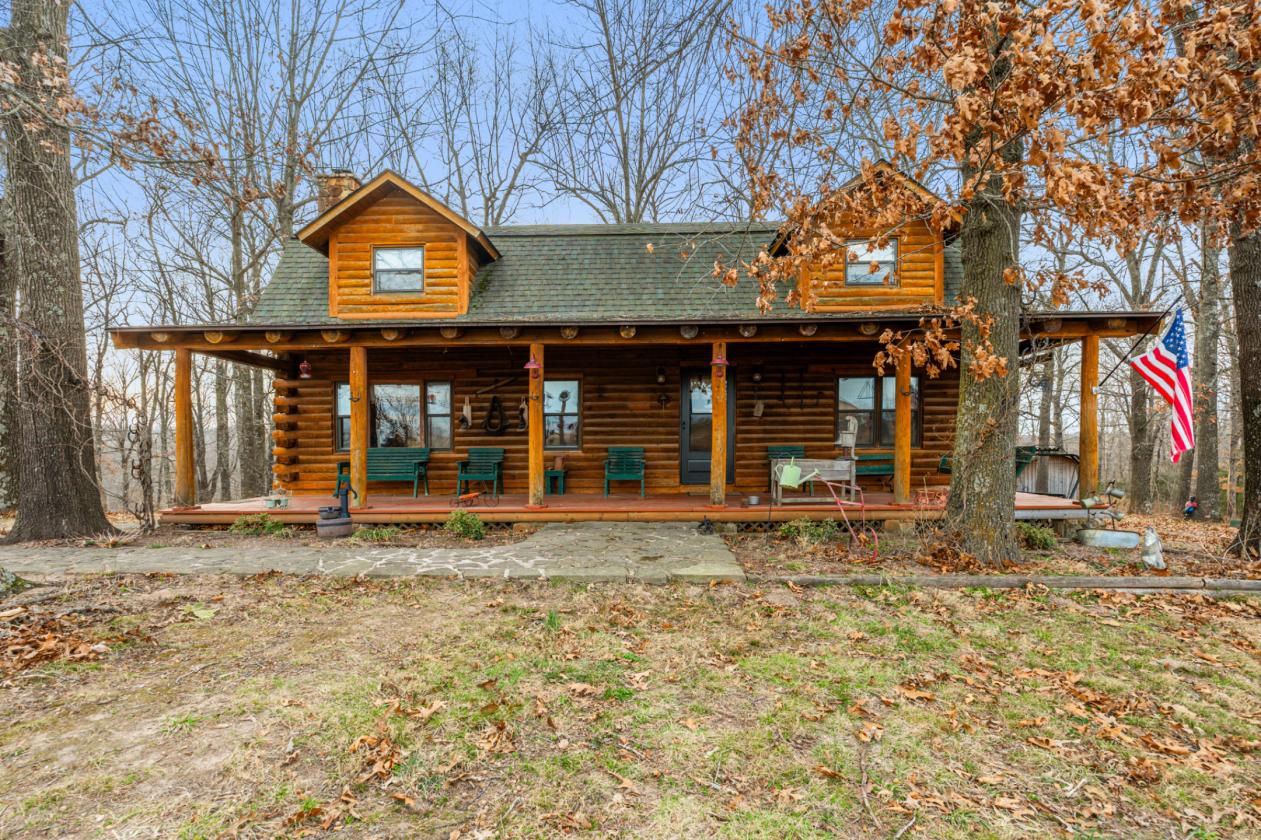 REAL LOG HOME on 12 Unrestricted Acres - photo 1