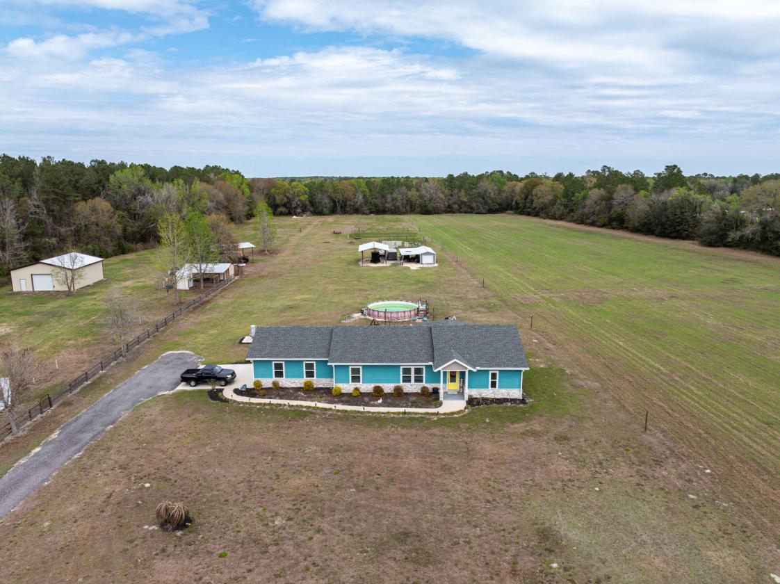5 Acres | Custom Home, Pole Barn, RV Parking - photo 1