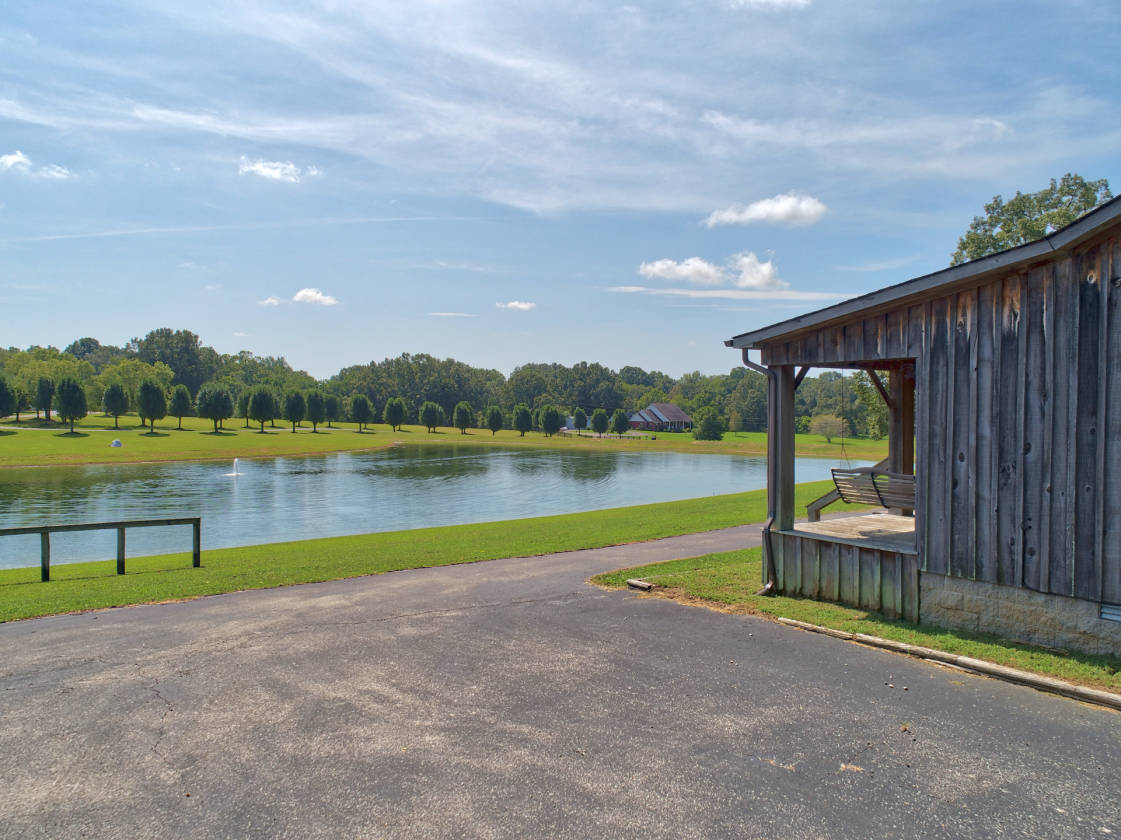 Beautiful home with 30 acres and small lake. McKenzie, Carroll County