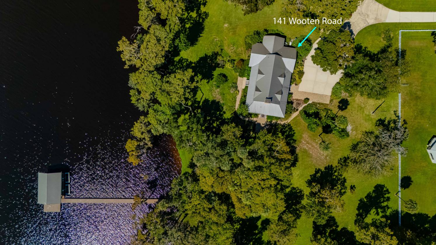 GORGEOUS RIVERFRONT PROPERTY WITH DOCK AND BARNS - photo 10
