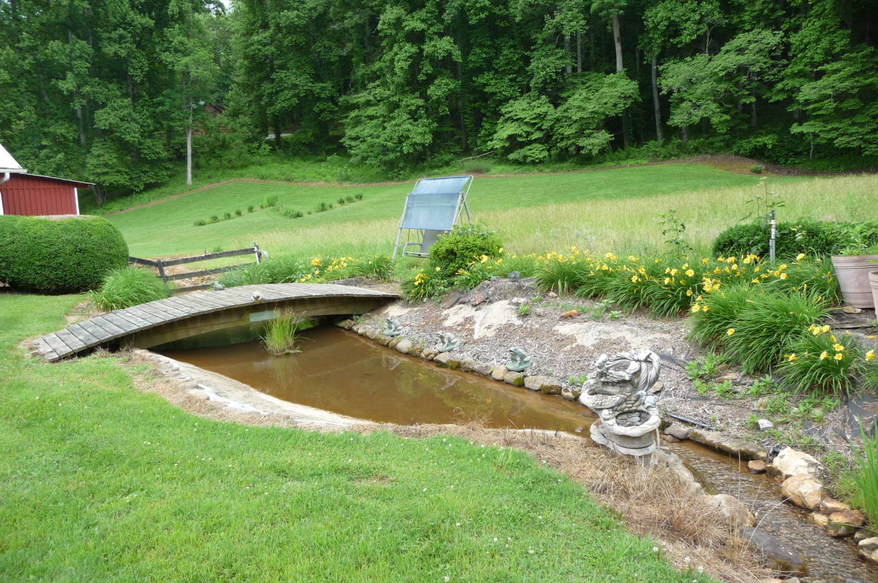 Horse Property for sale with beautiful pasture, a stream and