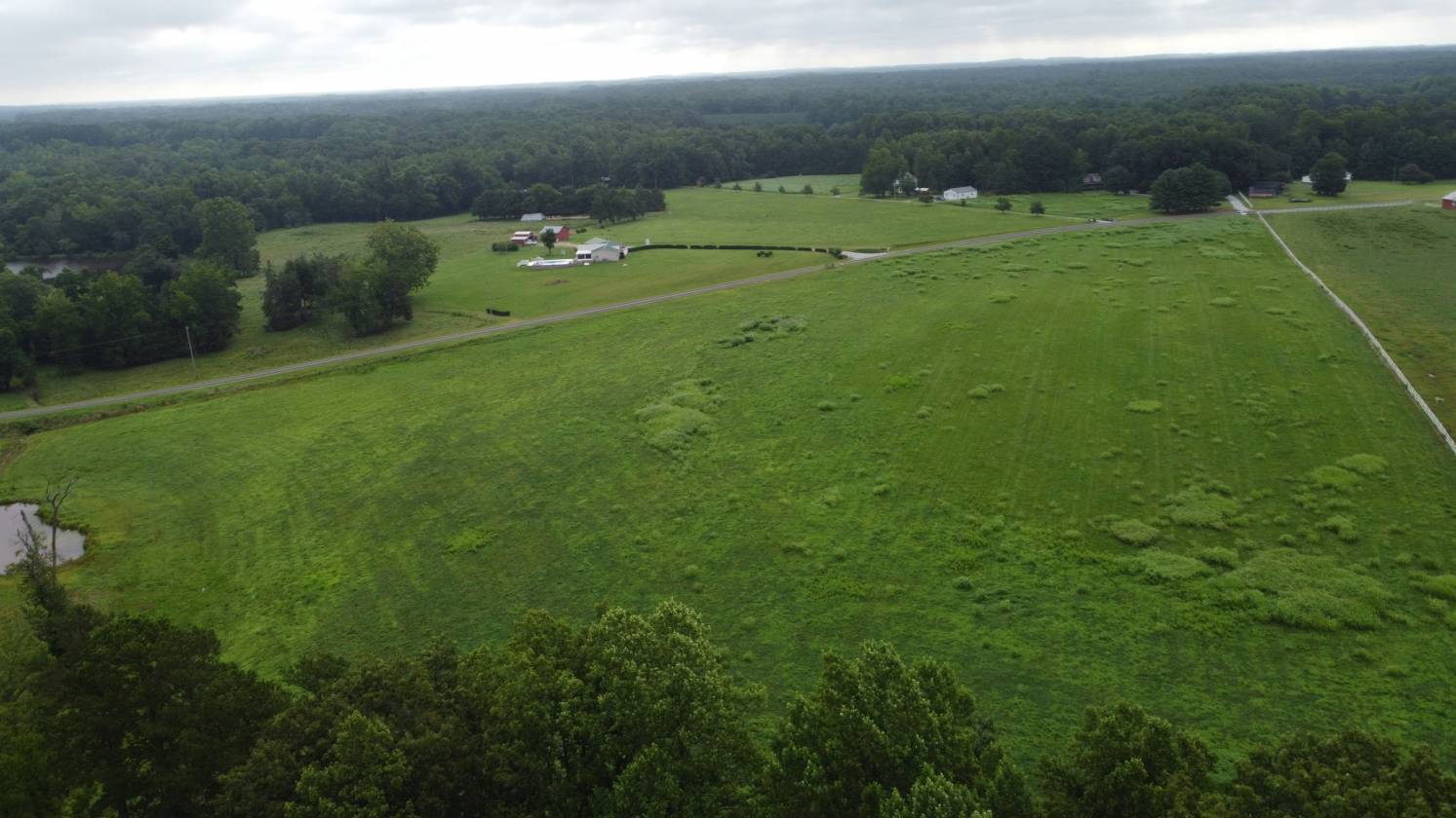 Beautiful field for your new home and horses too! - photo 1