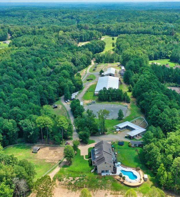 Worldclass equestrian facility on 47+ acres, & 5,678sq. ft. private