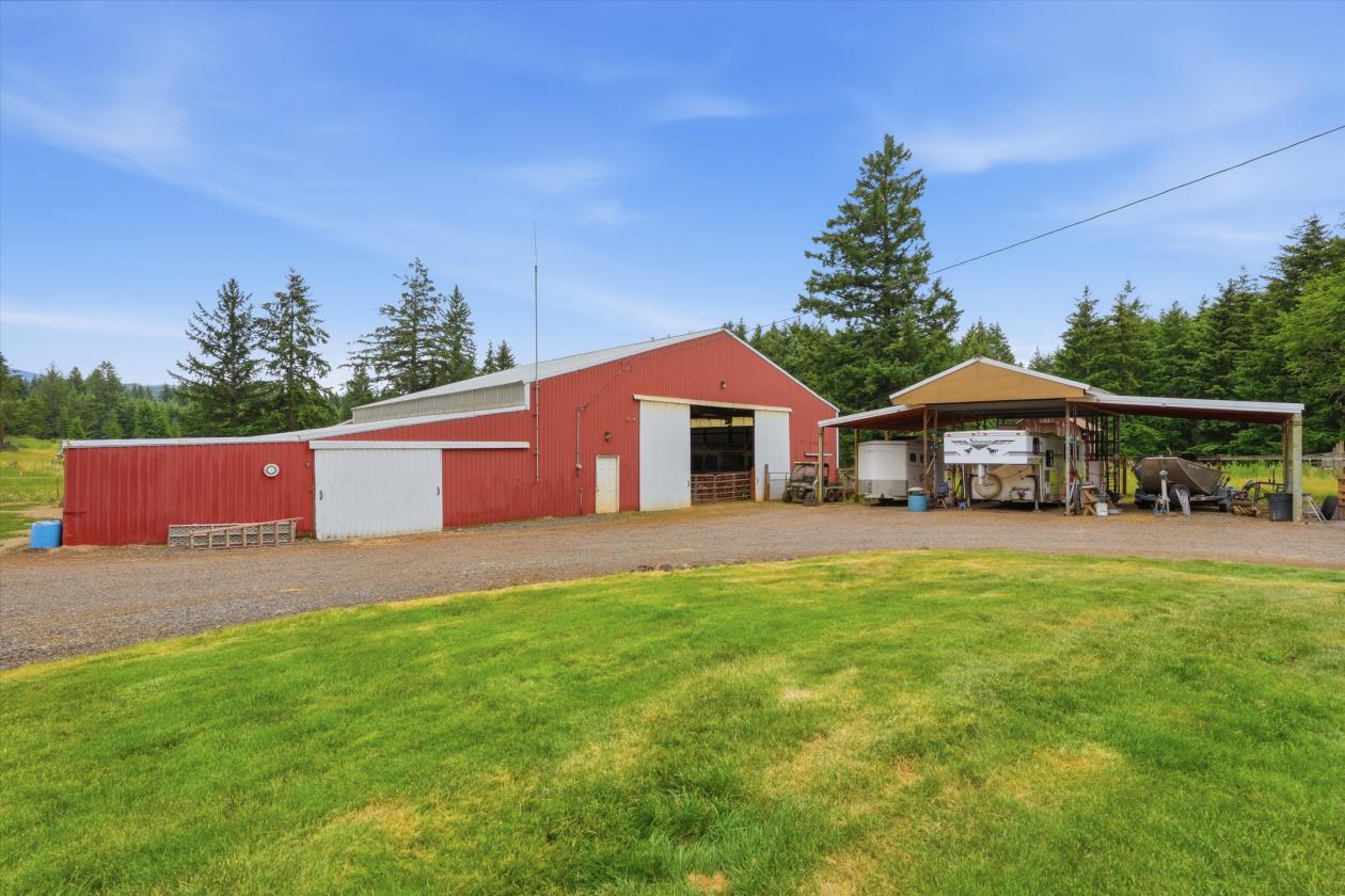 9.11 Acres with 8 Stall barn & Indoor Arena! - photo 19