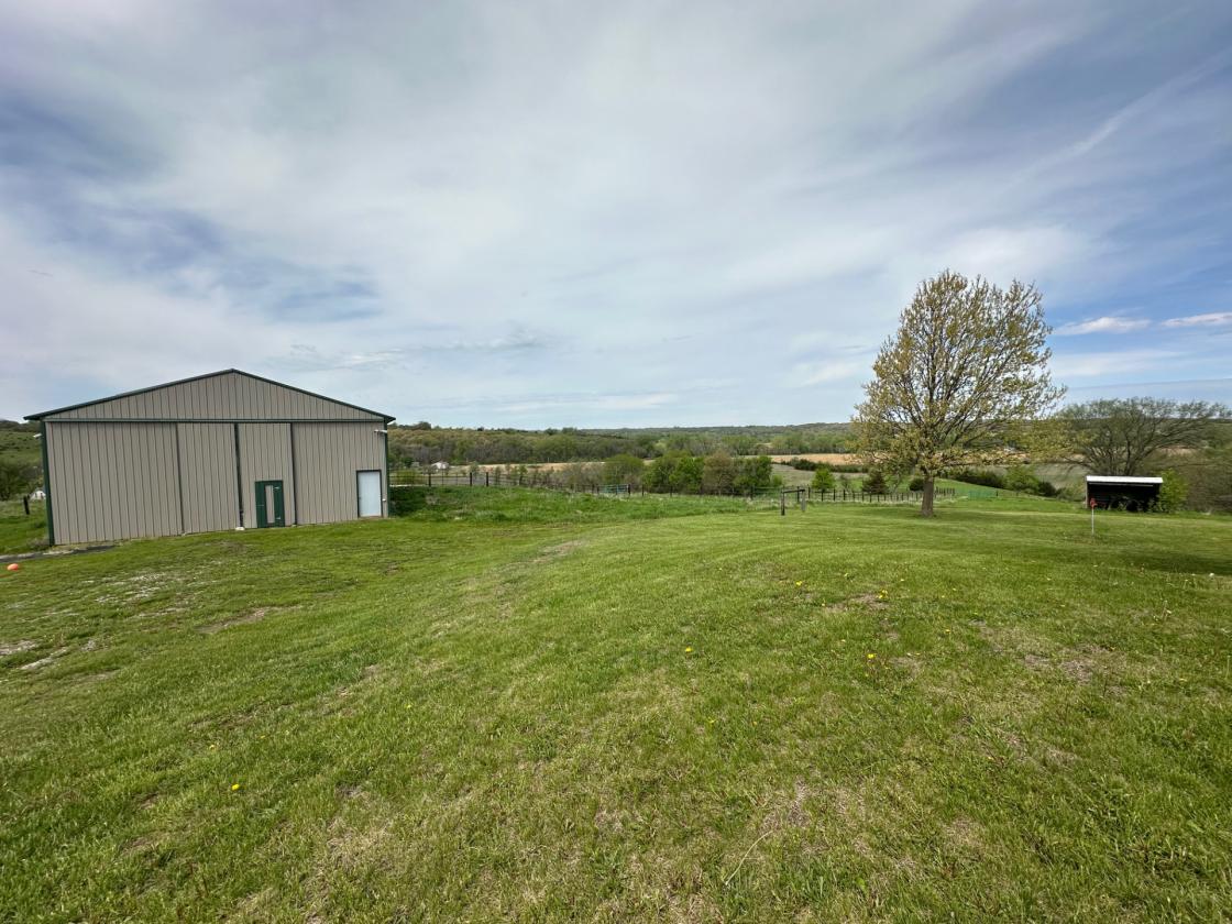 40 acre farm with stunning hilltop views! - photo 23