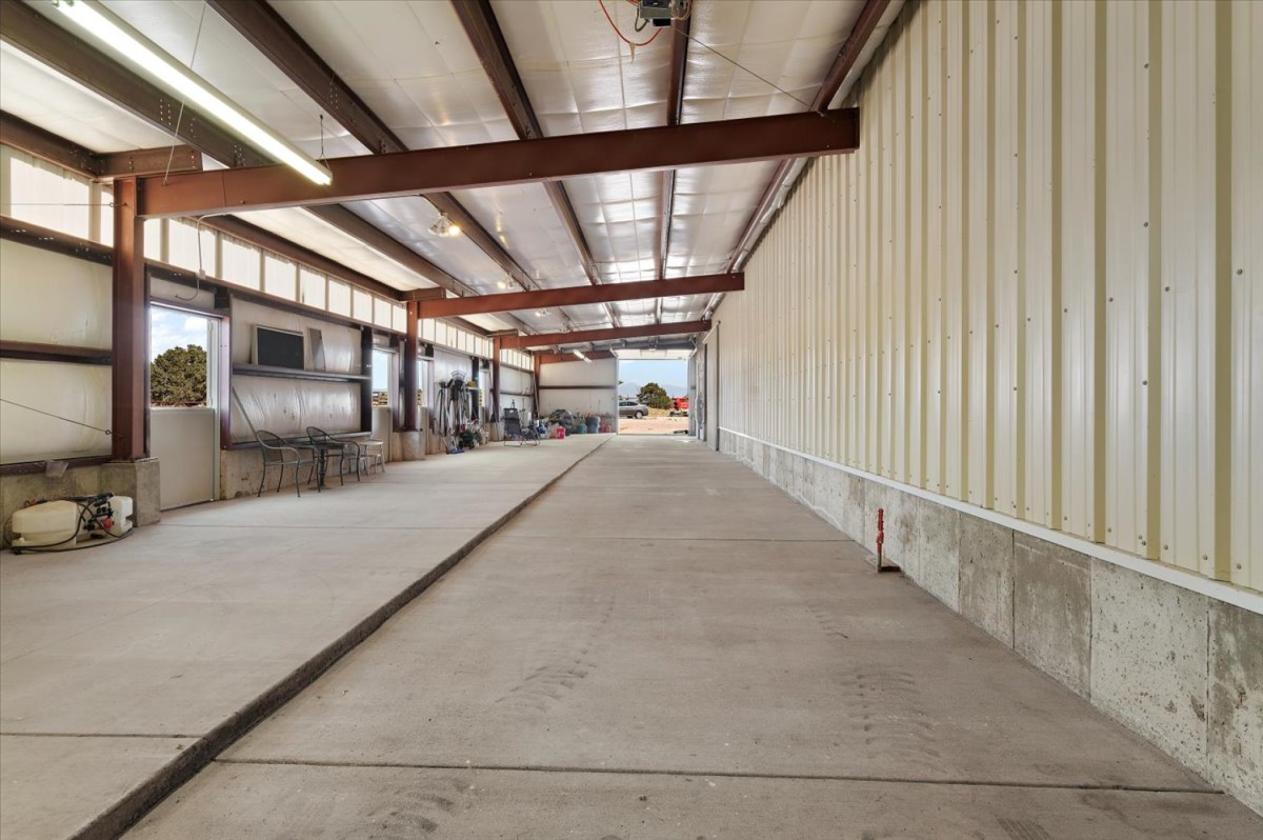 Pueblo ranch with 27,125 sq ft building - photo 17